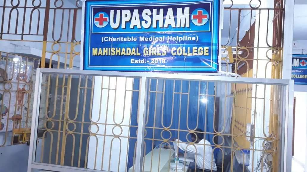 UPASHAM Charitable Medical Helpline signboard and consultation room
